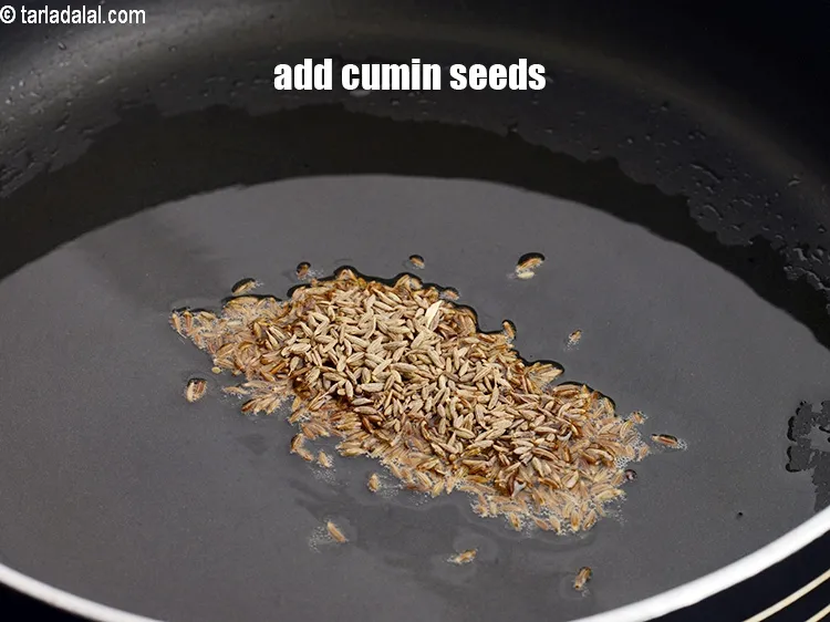 Step 18 – Add 1 tsp <a href="https://www.tarladalal.com/glossary-cumin-seeds-jeera-zeera-381i">cumin seeds (jeera)</a>.