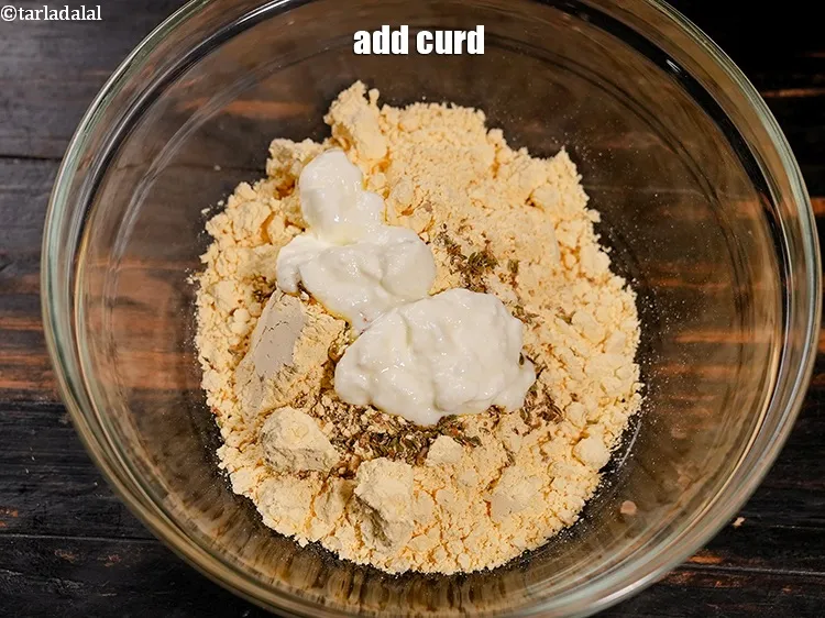 Step 17 – Add 2 tbsp <a href="https://www.tarladalal.com/glossary-curd-dahi-yogurt-yoghurt-383i">curd (dahi)</a>.