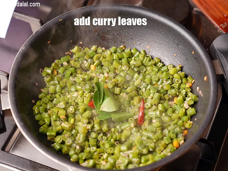 Step 17 – Add 6 to 7 curry leaves.