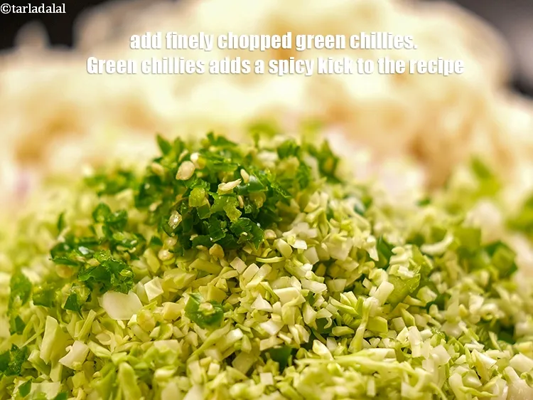 Step 17 – Add 1 tsp finely <a href="https://www.tarladalal.com/glossary-chopped-green-chilli-820i">chopped green chillies</a>. Green chillies adds a spicy kick to …