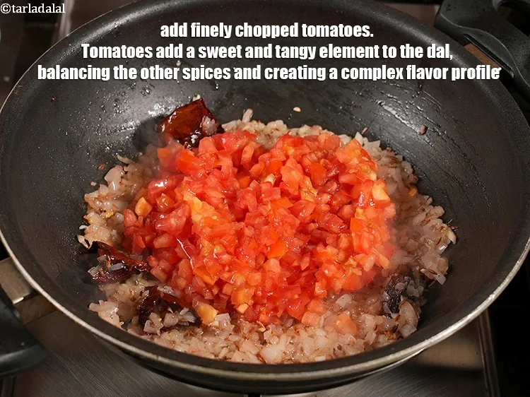 Step 17 – Add 1 cup finely <a href="https://www.tarladalal.com/glossary-chopped-tomatoes-779i">chopped tomatoes</a>. Tomatoes add a sweet and tangy element to …