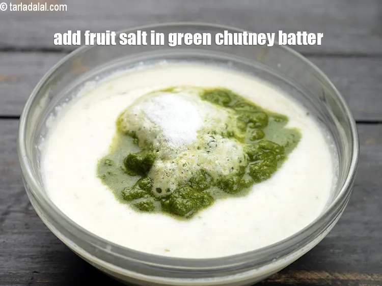 Step 18 – Meanwhile, add &frac12; tsp of fruit salt in the green chutney batter.