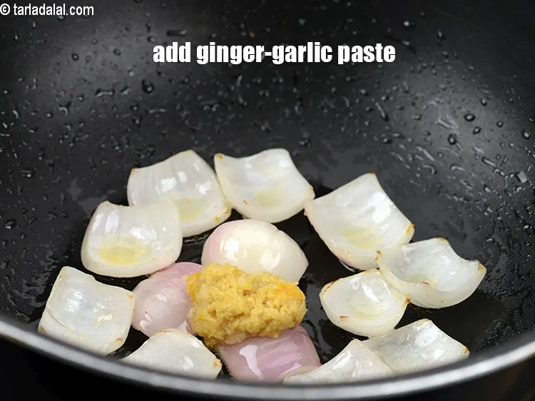 Step 18 – Add 1 tsp <a href="https://www.tarladalal.com/glossary-ginger-garlic-paste-adrak-lehsun-ki-pate-adrak-lahsun-ki-paste-939i">ginger-garlic (adrak-lehsun) paste</a>.