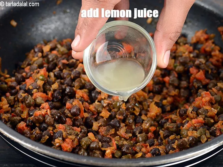 Step 17 – Add 2 tsp <a href="https://www.tarladalal.com/glossary-lemon-juice-numbi-ka-ras-nimbu-ka-juice-471i">lemon juice</a>.