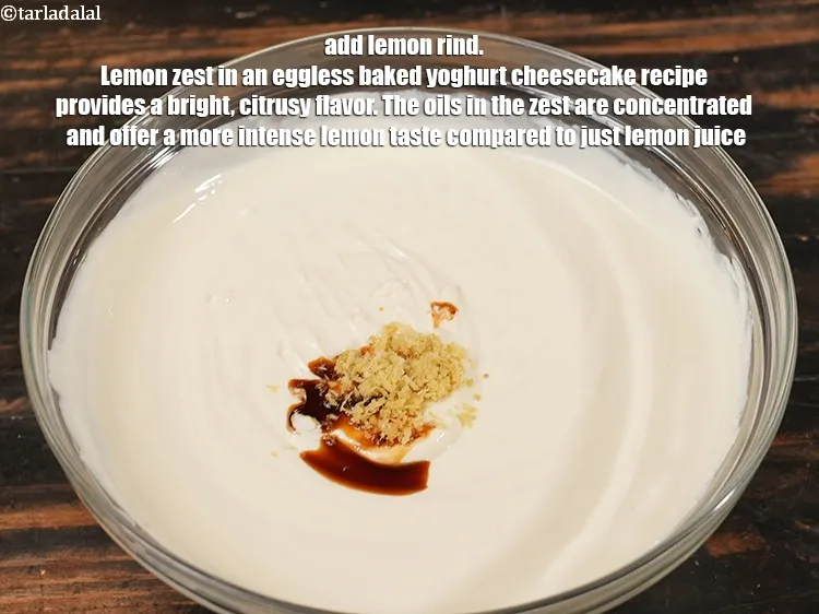 स्टेप 17 – १ टी-स्पून&nbsp;<a href=""https://www.tarladalal.com/glossary-lemon-rind-hindi-958i"">नींबू का छिलका</a>&nbsp;डालें। अंडे रहित बेक्ड योगर्ट चीज़केक …