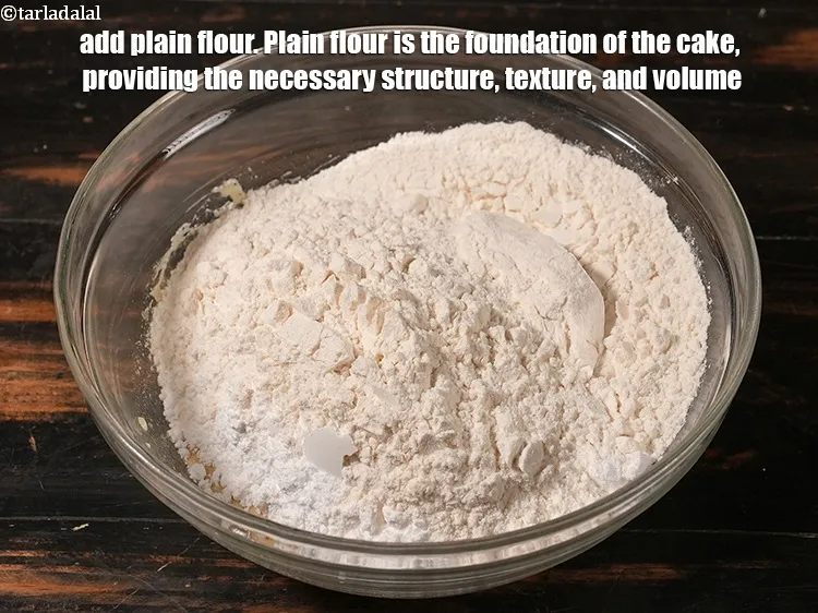 Step 17 – Add 1 cup <a href="https://www.tarladalal.com/glossary-plain-flour-maida-188i">plain flour (maida)</a>. Plain flour is the foundation of the cake, …