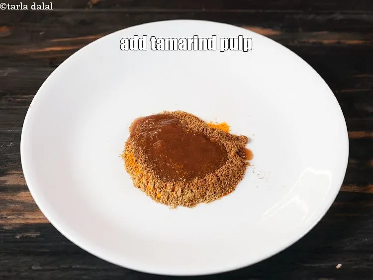 Step 17 – Add 1&frac12; tbsp&nbsp;<a href="https://www.tarladalal.com/glossary-tamarind-pulp-tamarind-extract-imli-ka-pulp-838i">tamarind (imli) pulp</a>.