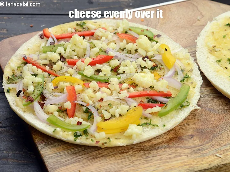 Step 17 – Add cheese evenly over it.&nbsp;