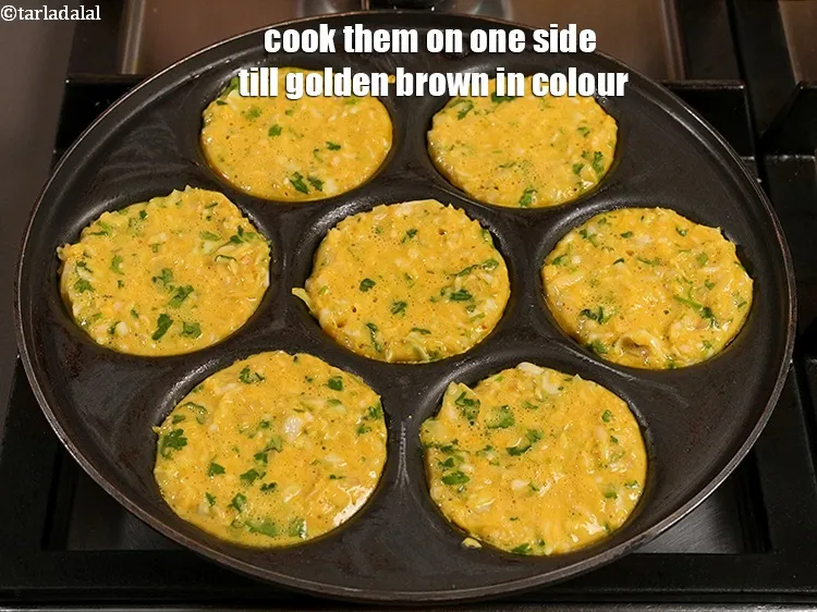 Step 31 – Cook them on one side till golden brown in colour.
