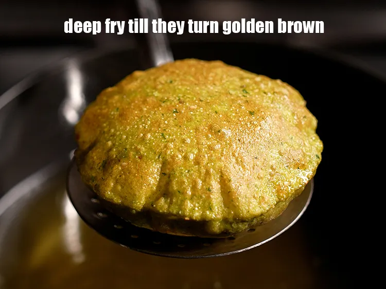 Step 17 – Deep fry on a medium flame, till they turn golden brown in colour from all …