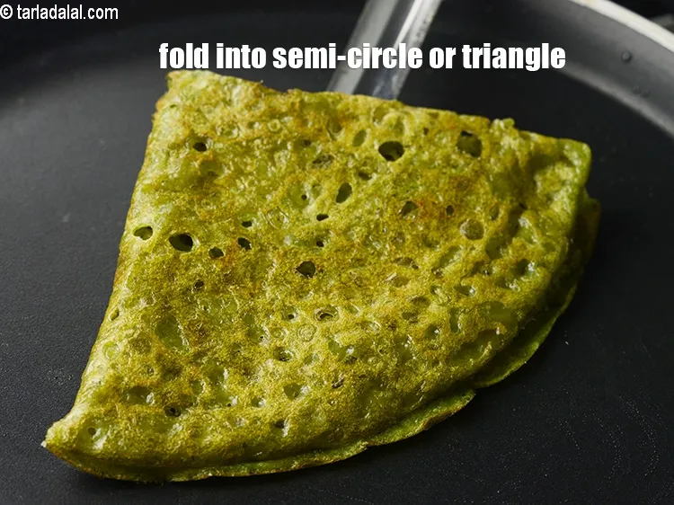 Step 17 – Fold it into a semi-circle or a triangle and remove in a serving plate.