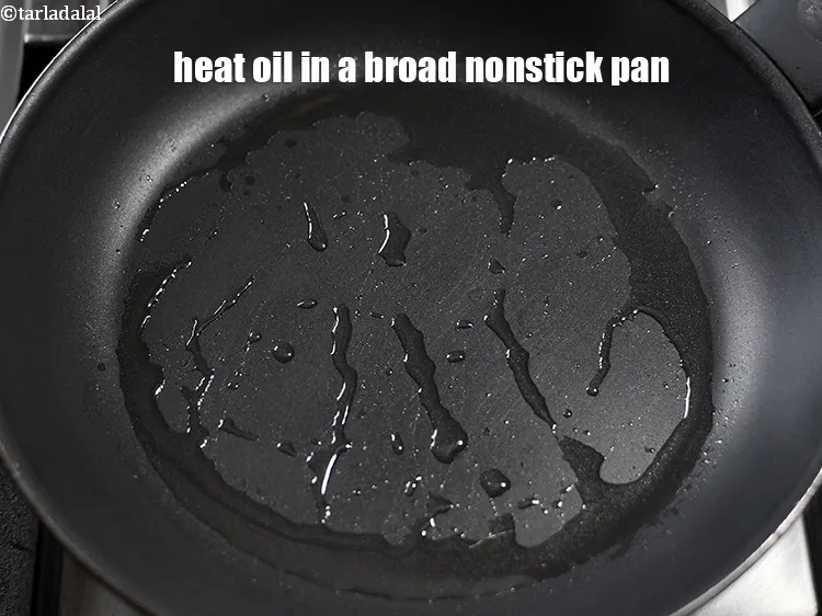Step 17 – Heat 1 tbsp oil in a broad non-stick pan.