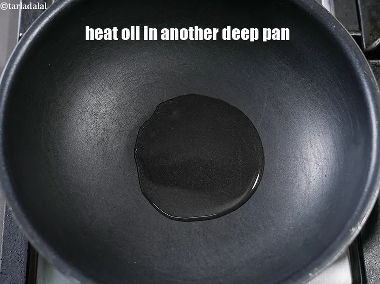 Step 17 – Heat 2 tbsp oil in another deep pan.