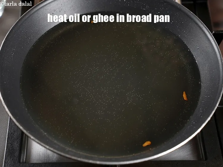Step 19 – Heat oil or ghee in broad pan.