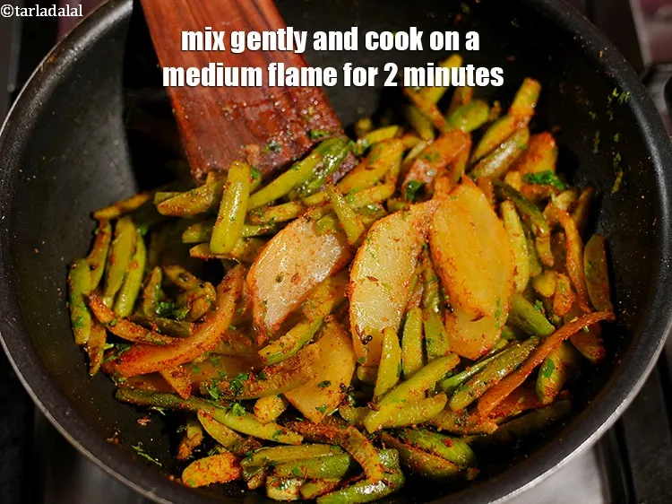 Step 17 – Mix gently and cook on a medium flame for 2 minutes, while stirring occasionally.