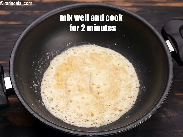 Step 22 – Mix well and cook on a medium flame for 2 minutes, while stirring continuously.