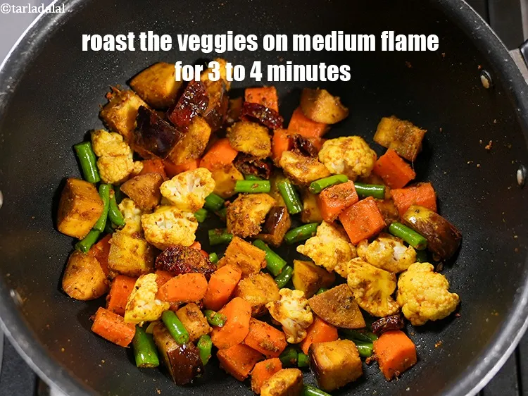Step 17 – Roast the veggies on medium flame for 3 to 4 minutes, while stirring occasionally.&nbsp;