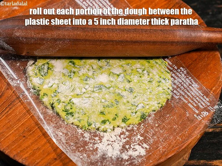 Step 17 – Roll out each portion of the dough between the plastic sheet into a 5 inch …