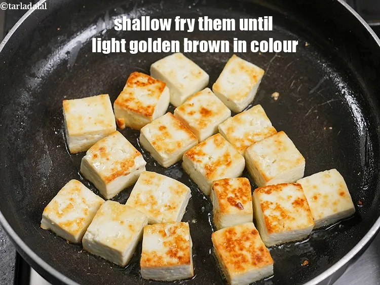 Step 17 – Shallow fry them on medium flame until light golden brown in colour. Keep aside.&nbsp;