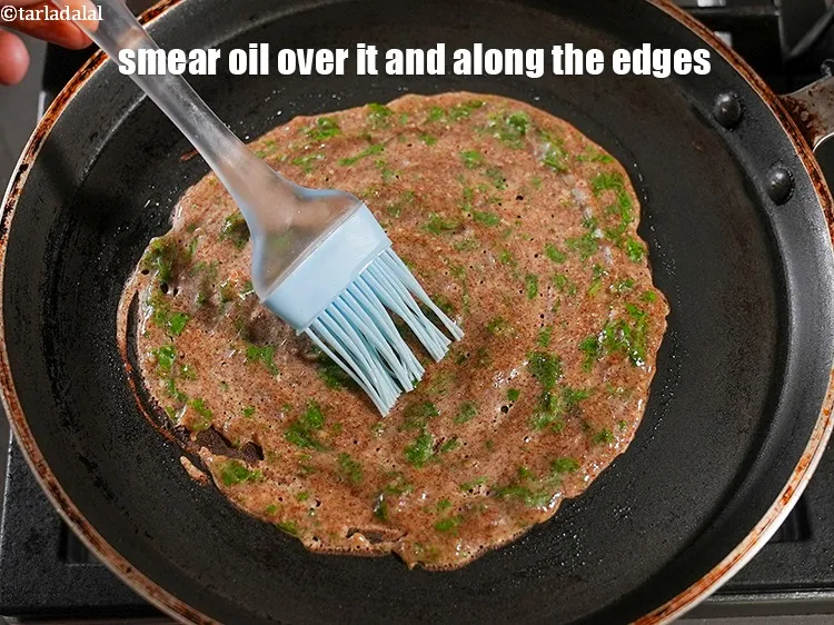 Step 17 – Smear &frac14; tsp oil over it and along the edges.