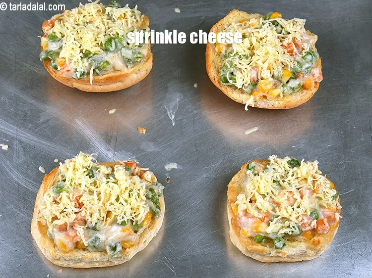 Step 18 – Sprinkle 1 tbsp of cheese evenly over it.&nbsp;