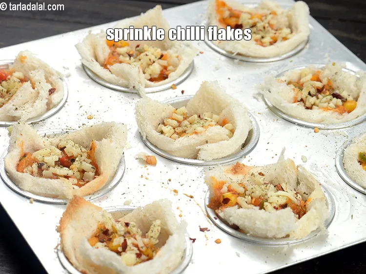 Step 17 – Sprinkle little chilli flakes evenly over it.