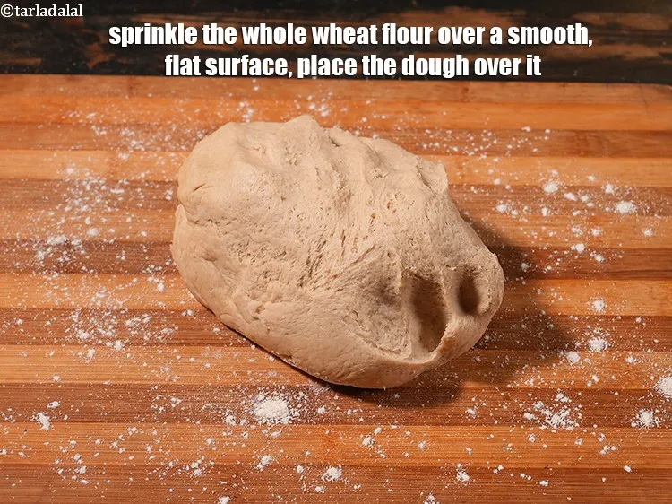 Step 21 – Sprinkle the whole wheat flour over a smooth, flat surface, place the dough over it. …