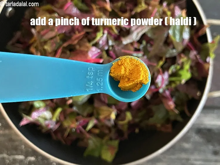 Step 23 – Add&nbsp;<meta charset="UTF-8" />a pinch&nbsp;<a href="glossary-turmeric-powder-haldi-645i">turmeric powder (haldi)</a>.
