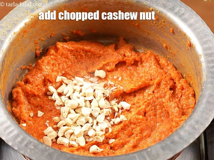 Step 17 – Add 1 tbsp <a href="https://www.tarladalal.com/glossary-chopped-cashew-nut-791i">chopped cashew nut (kaju)</a>.
