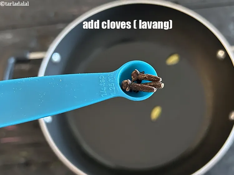 Step 30 – Add&nbsp;<meta charset="UTF-8" />3&nbsp;<a href="glossary-cloves-laung-lavang-322i">cloves (laung / lavang)</a>.