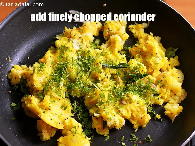 Step 18 – Add 1 tbsp finely <a href="https://www.tarladalal.com/glossary-chopped-coriander-783i">chopped coriander (dhania)</a>.