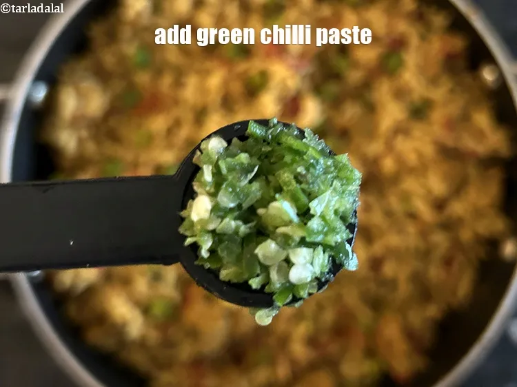 Step 23 – Add&nbsp;<strong>1/2 tsp <a href="https://www.tarladalal.com/how-to-make-green-chilli-paste-42729r">green chilli paste</a></strong>. See <a href="https://www.tarladalal.com/how-to-make-green-chilli-paste-42729r">how to make green chilli paste</a>.