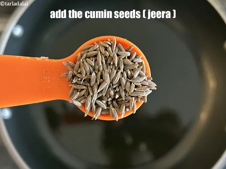 Step 17 – When the ghee is hot and melted, add <meta charset="UTF-8" />1 tsp&nbsp;<a href="glossary-cumin-seeds-jeera-zeera-381i">cumin seeds (jeera)</a>.