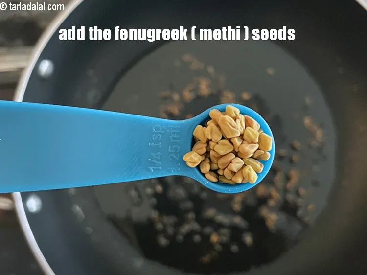 Step 17 – <p>Add 1/4 tsp <a href="https://www.tarladalal.com/glossary-fenugreek-seeds-methi-dana-methi-ke-dane-methi-seeds-991i"><strong>fenugreek (methi) seeds</strong></a><strong>.</strong></p>