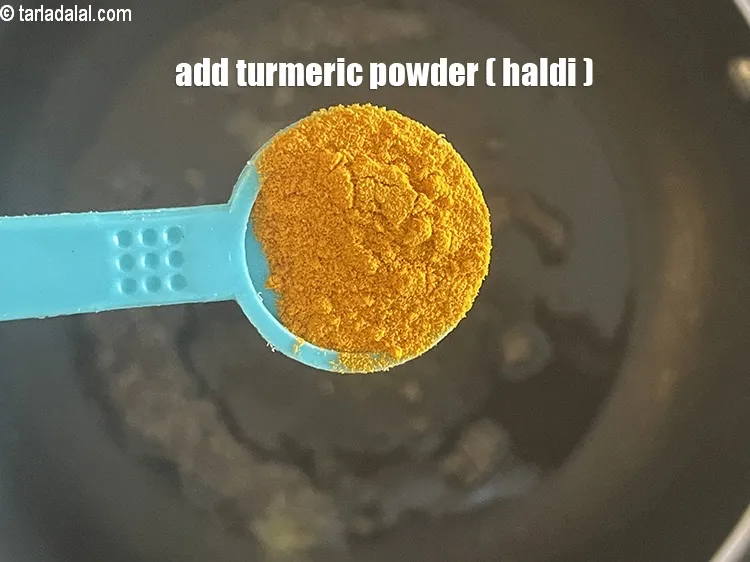 Step 19 – Add&nbsp;<meta charset="UTF-8" />1/2 tsp&nbsp;<a href="glossary-turmeric-powder-haldi-645i">turmeric powder (haldi)</a>.