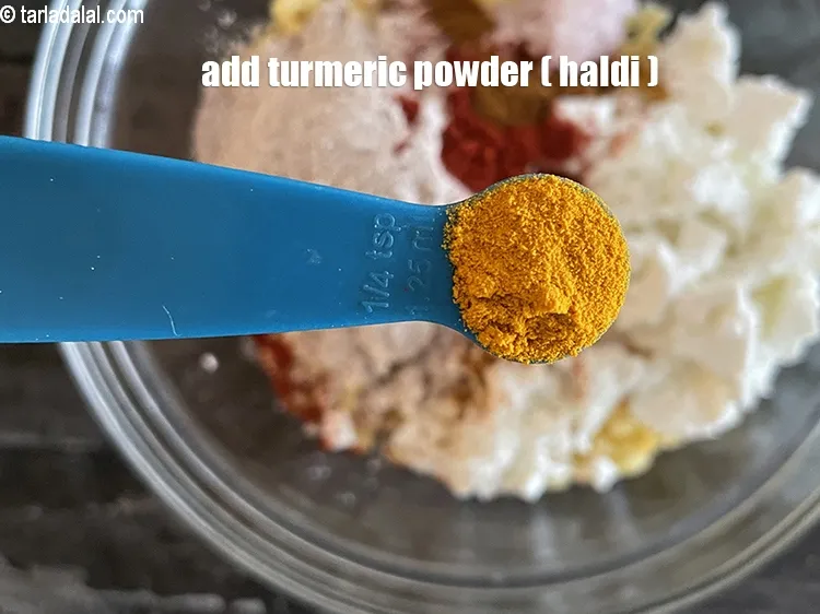 Step 25 – Add&nbsp;<meta charset="UTF-8" />1/4 tsp&nbsp;<a href="glossary-turmeric-powder-haldi-645i">turmeric powder (haldi)</a>.
