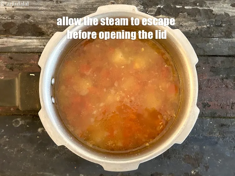 Step 20 – Allow the steam to escape before opening the lid.