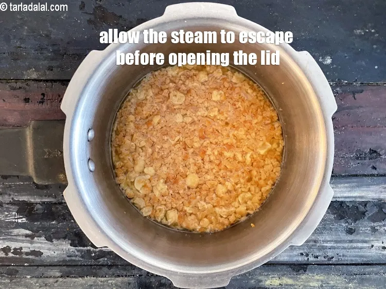 Step 19 – Allow the steam to escape before opening the lid. Keep aside.