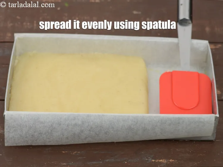 Step 17 – Transfer the mixture into a&nbsp;250 mm. X 125 mm. (10&rdquo; x 5&rdquo;) lined and greased …