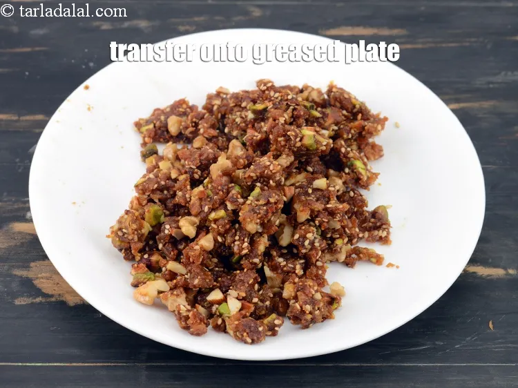 Step 17 – Transfer the mixture onto a greased plate.