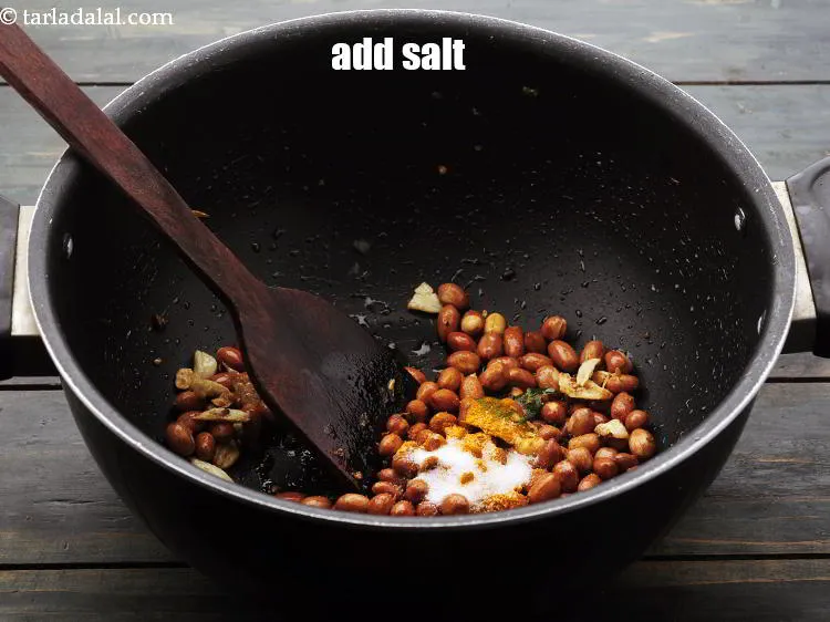 Step 16 – Add <a href="https://www.tarladalal.com/glossary-salt-namak-table-salt-418i" target="_blank">salt</a>.