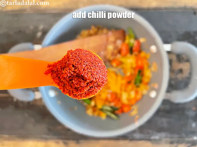 Step 18 – Add&nbsp;<meta charset="UTF-8" />1 tbsp&nbsp;<a href="glossary-chilli-powder-red-chilli-powder-339i">chilli powder</a>.