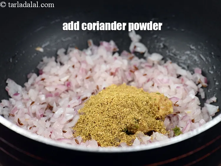 Step 22 – Add 2 tsp&nbsp;<a href="https://www.tarladalal.com/glossary-coriander-powder-dhania-powder-370i">coriander (dhania) powder</a>.