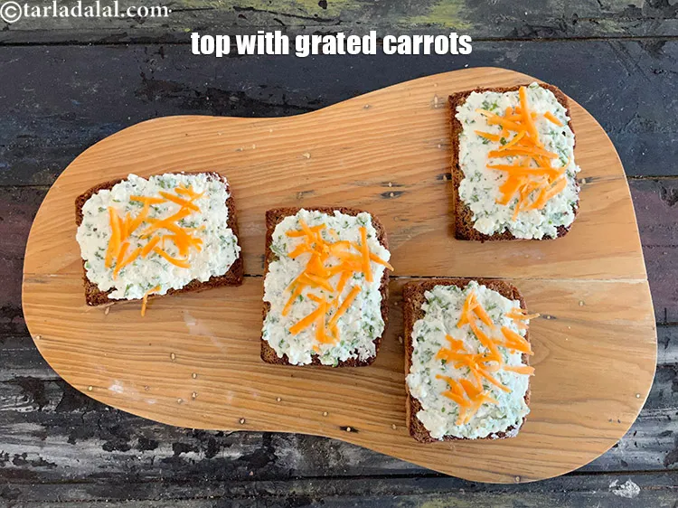 Step 18 – <meta charset="UTF-8" /> Sprinkle 1 tsp grated carrot over it.&nbsp;