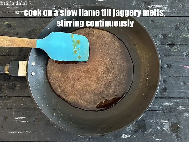 Step 17 – Cook on a slow flame till the jaggery melts, while stirring continuously.