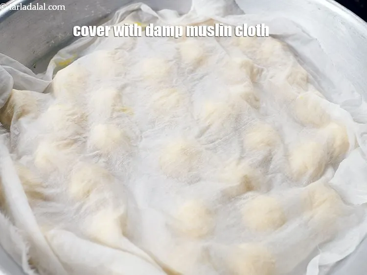 Step 16 – Cover each ball with damp muslin cloth. So that the dough doesn&rsquo;t dry.