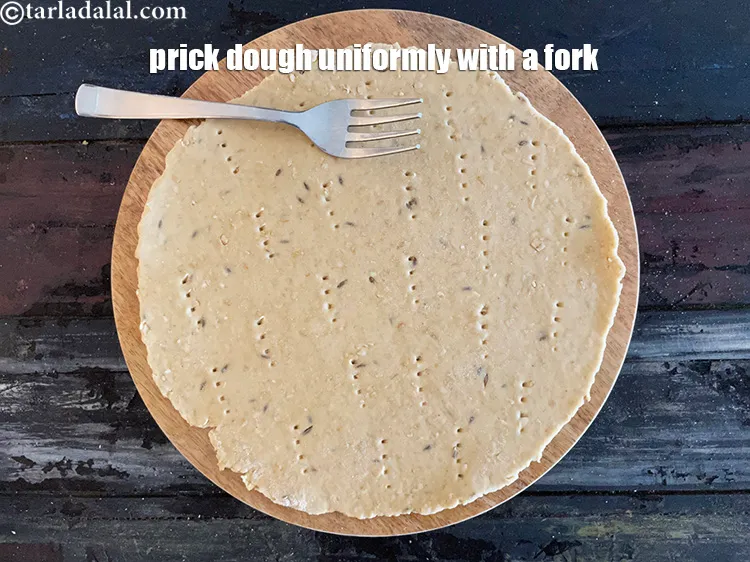 Step 19 – Prick the dough with a fork all over the dough. This will help when we …