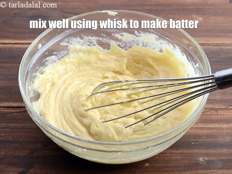 Step 18 – Mix well using a whisk to make a dropping consistency batter.