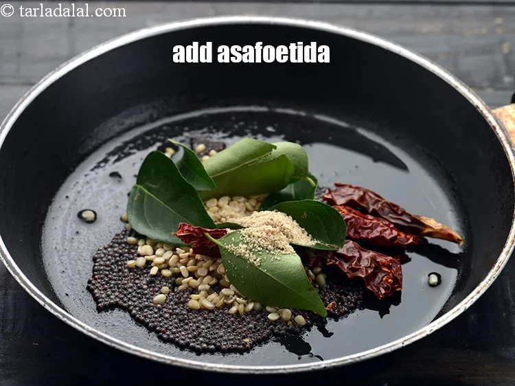 Step 18 – Add 1/4 tsp&nbsp;<a href="https://www.tarladalal.com/glossary-asafoetida-hing-113i">asafoetida (hing)</a>