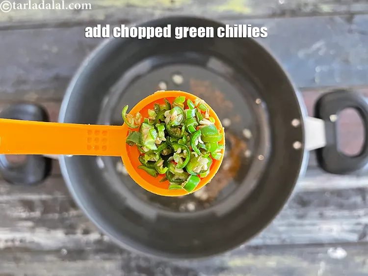 Step 29 – Add&nbsp;<meta charset="UTF-8" />1 tsp&nbsp;finely&nbsp;<a href="glossary-chopped-green-chilli-820i">chopped green chillies</a>.